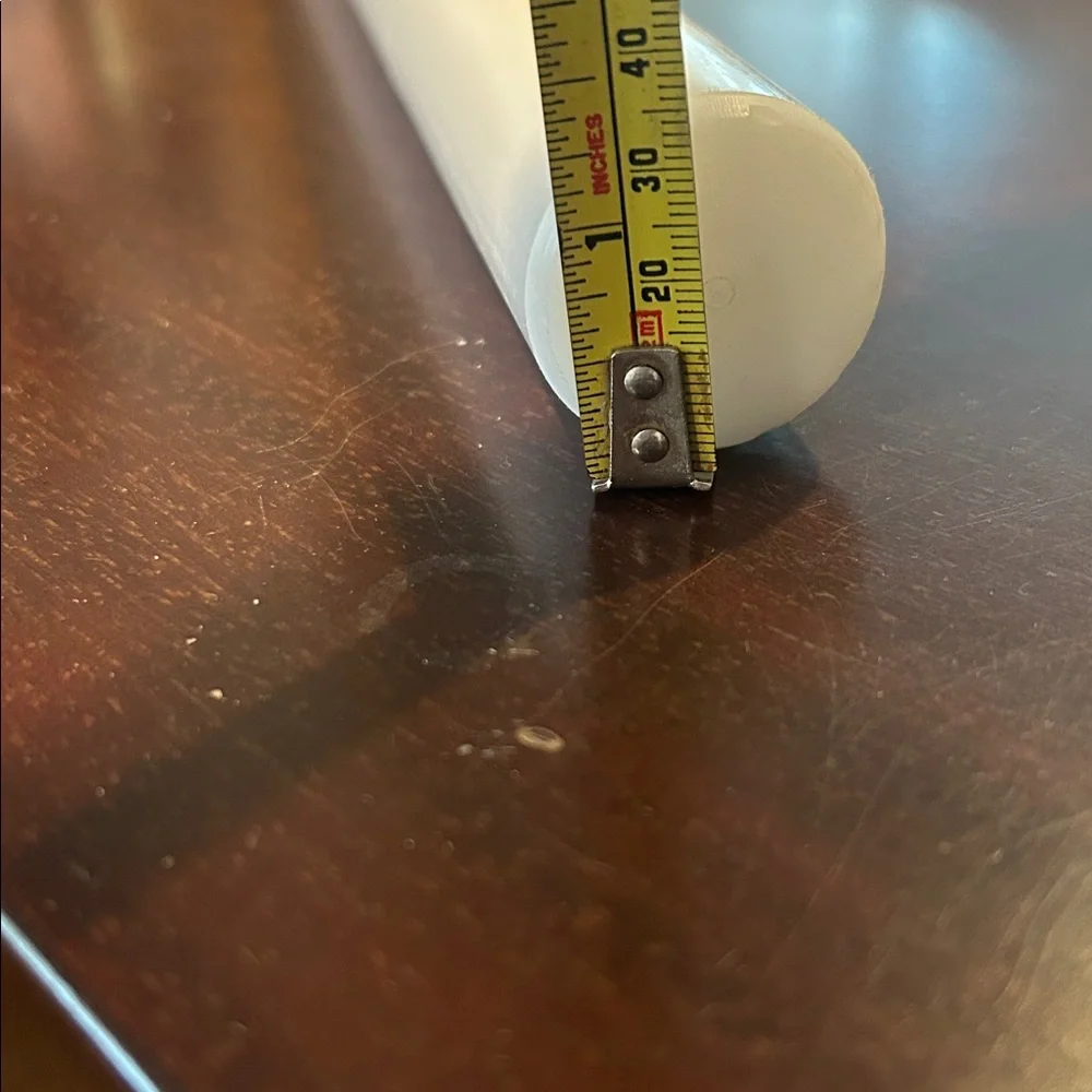 Plastic rolling pin approximately 20”